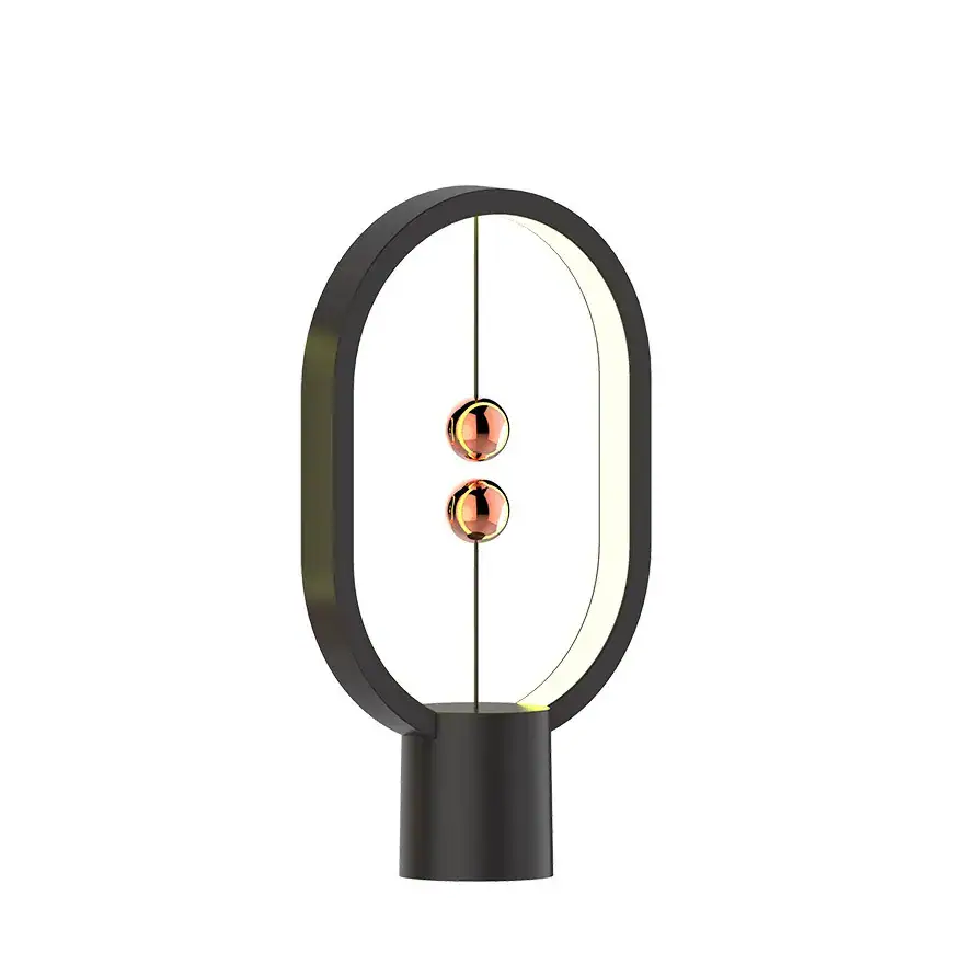 lampe-heng-balance-mini-noir-1 Lampe de bureau au design scientifique moderne avec deux ampoules en cuivre, idéale pour la décoration de bureau ou d'espace de travail inspiré de la science.