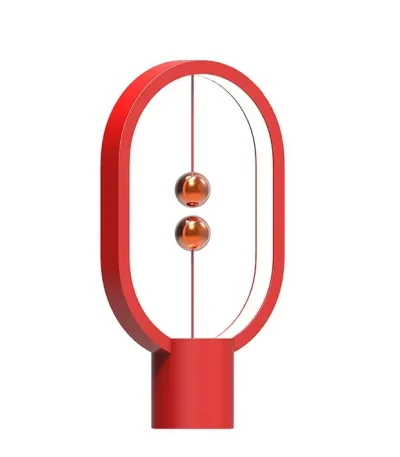 Lampe Newton en verre rouge avec cadre ovale en métal, design moderne et scientifique, idéale pour décoration de bureau ou salon.