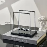 Péndulo de Newton de Calidad