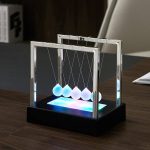 Péndulo de Newton con luz LED