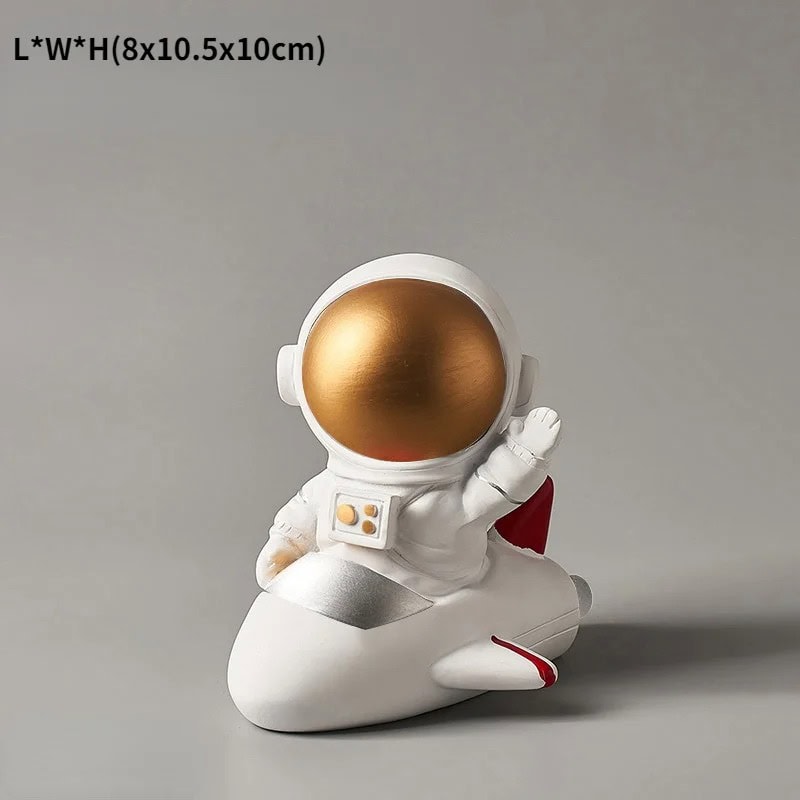 figurine-astronaute-sur-fusee-1 Figura Astronauta en Cohete – Image 1