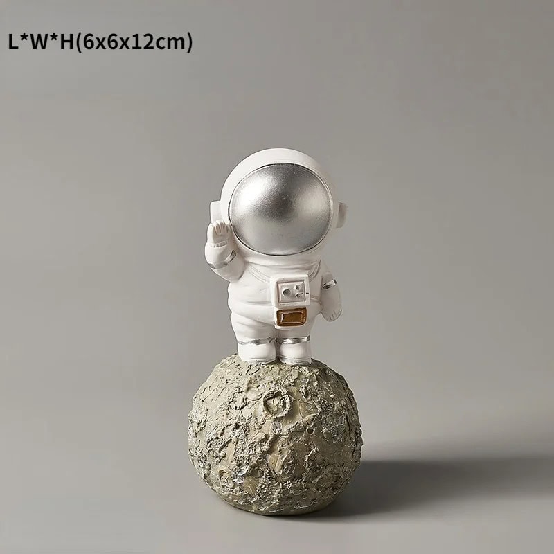 figurine-astronaute-sur-la-lune-1 Figura Astronauta en la Luna – Image 1