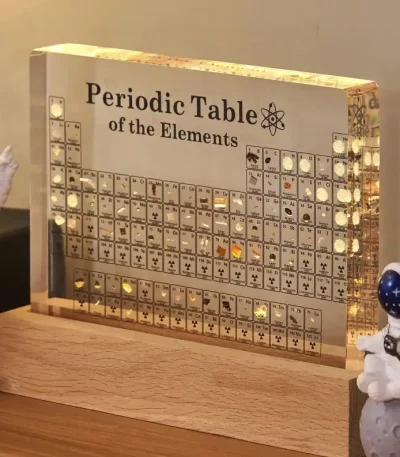 Tableau périodique interactif avec effets lumineux, décor scientifique pour espace ou bureau.