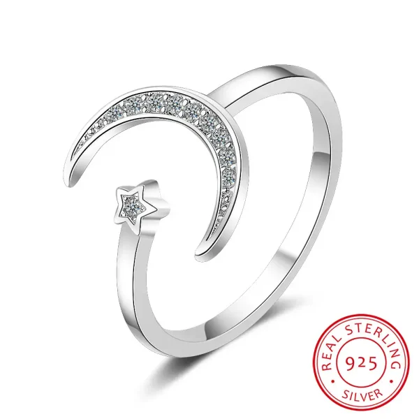 Bague en argent sterling 925 avec étoile et lune, ornée de cristaux brillants, design élégant et moderne, idéale pour les amateurs de bijoux inspirés de l'astronomie.