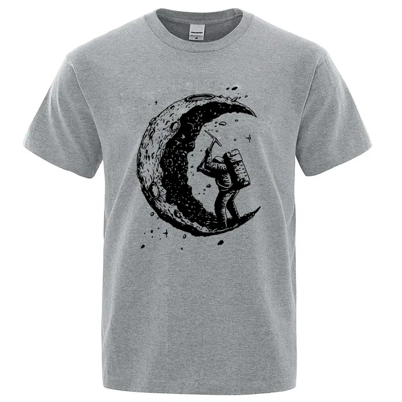 T-shirt gris avec illustration d'un astronaute sur la lune, style artistique et moderne, parfait pour les amateurs de science et d'astronomie.