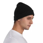 Bonnet en laine noir unisexe, chaud et confortable, idéal pour l'hiver, avec un design simple et élégant, parfait pour compléter un look décontracté ou urbain.
