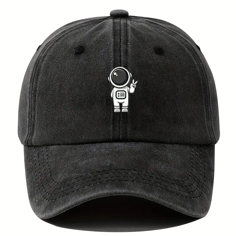 casquette-astronaute-coucou-1 Casquette noire avec logo d'astronaute blanc.