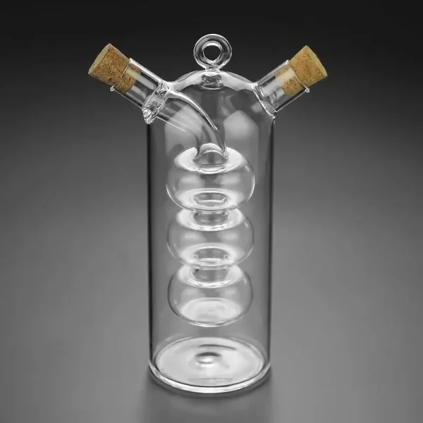 Vase en verre transparent de style scientifique avec deux bouchons en liège, conçu pour la décoration ou l'expérimentation. Parfait pour un décor de style laboratoire ou scientifique.