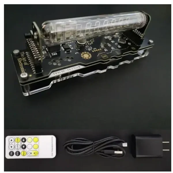 Panneau de contrôle électronique avec affichage numérique, télécommande, câble USB et adaptateur secteur pour expériences scientifiques.