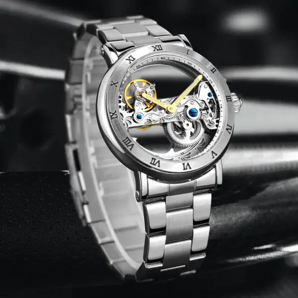 Montre squelette mécanique en acier inoxydable avec mouvement visible, design élégant et sophistiqué, idéale pour les amateurs de science et de décoration horlogère.