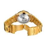 Montre mécanique dorée avec bracelet en acier, vue arrière.