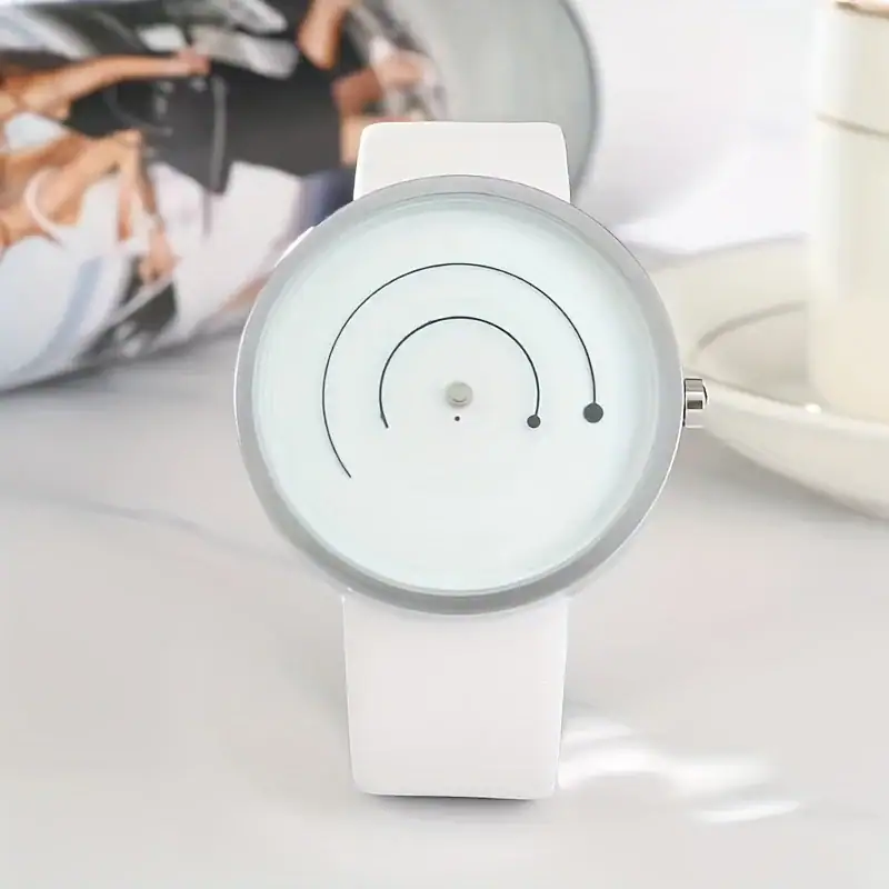 montre-insolite-scientifique-1 Montre moderne avec affichage circulaire blanc et aiguilles noires, design épuré et élégant, idéale pour une décoration scientifique ou un accessoire tendance.