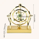 Horloge décorative inspirée de modèles scientifiques avec sphères et anneaux métalliques dorés, idéale pour la décoration de bureau ou d'étagère.