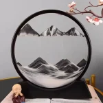 Objet décoratif en forme de cercle avec montagnes et cerisier en fleurs.