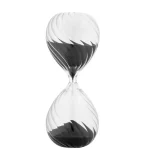 Sablier scientifique en verre noir et blanc, design élégant, symbole de temps et de précision, parfait pour la décoration de bureau ou d'études.