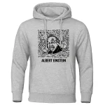 Sweat à capuche gris avec illustration humoristique d'Albert Einstein faisant un geste de paix, entouré de formules mathématiques et scientifiques.