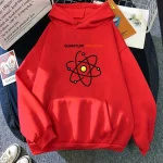 Veste à capuche rouge avec motif atomique et texte "Quantum Physics" pour passionnés de sciences. Confortable et stylée, idéale pour les amateurs de physique quantique.