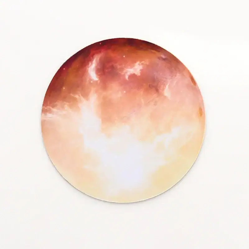 tapis-de-souris-planete-mars-1 Panneau en verre représentant une lune avec dégradé de couleurs chaudes, évoquant un coucher de soleil ou une phase lunaire.