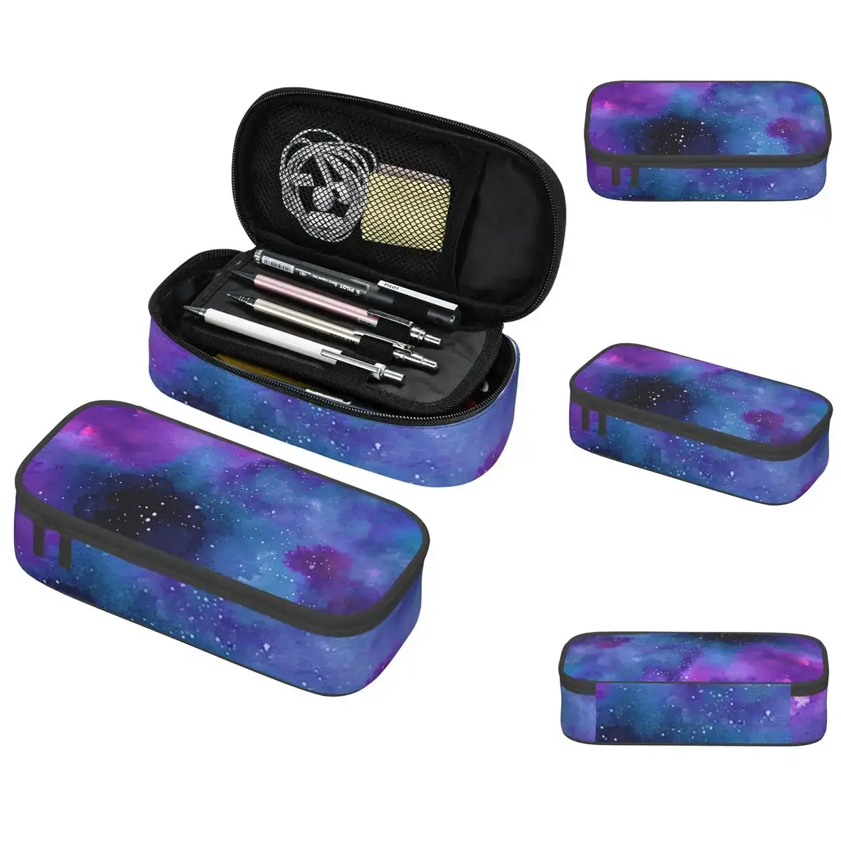 trousse-cosmos-1 Étui à stylos galaxie avec compartiments, idéal pour la papeterie et la décoration de bureau. Design inspiré de l'univers avec couleurs cosmiques, pratique et esthétique.