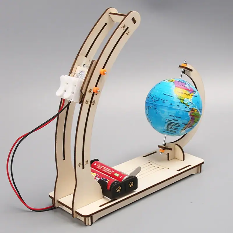 globe-dalternation-jour-et-nuit-educatif-diy-1 Modèle éducatif en bois avec globe terrestre, parfait pour l'apprentissage des sciences et la décoration de bureau ou salle de classe.