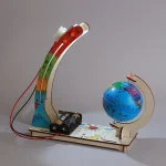 Modèle éducatif avec globe terrestre et expérience scientifique illustrant la rotation de la Terre, idéal pour l'apprentissage en classe ou à la maison.