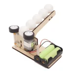 Modèle de machine de Newton avec balles suspendues, expérience éducative pour démonstration de la conservation de l'énergie.