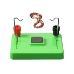 Dispositif de démonstration de résistance électrique avec fils, bornes, et plaque chauffante pour expériences scientifiques.