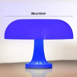 Lampe de bureau en forme de champignon, éclairage LED bleu, design moderne et original pour décoration scientifique ou geek.