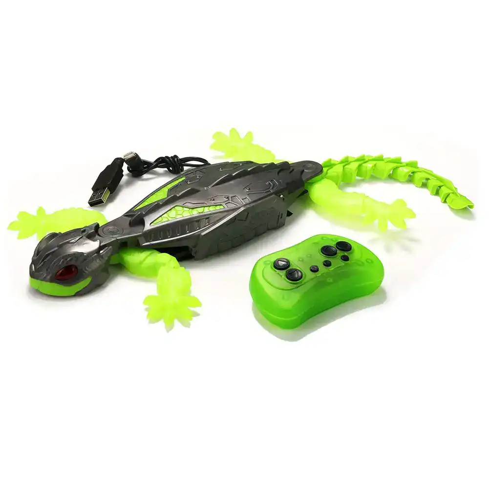 robot-gecko-telecommande-1 Robot crocodile télécommandé avec queue lumineuse verte, contrôleur sans fil, idéal pour jouets éducatifs et divertissement pour enfants.