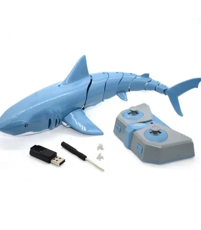 Requin robot éducatif en plastique bleu avec télécommande, clé USB et accessoires pour apprentissage interactif.