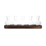 Vase en verre transparent avec support en bois, idéal pour expériences scientifiques ou décoration de style laboratoire. Parfait pour les amateurs de science et de décoration originale.