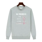 Sweat-shirt avec motifs mathématiques et amour.