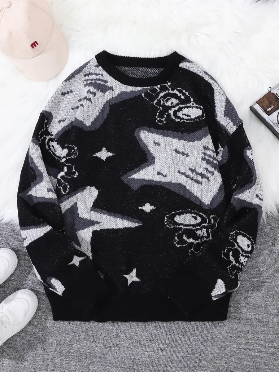 pull-astronaute-et-etoile-1 Pull scientifique à motifs d'astronomie et d'astres, parfait pour les amateurs de science et de décoration intérieure inspirée de l'univers.