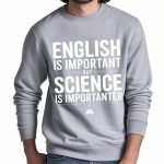 Sweat-shirt gris avec message humoristique sur l'importance de la science par rapport à l'anglais, idéal pour les amateurs de sciences et d'humour.