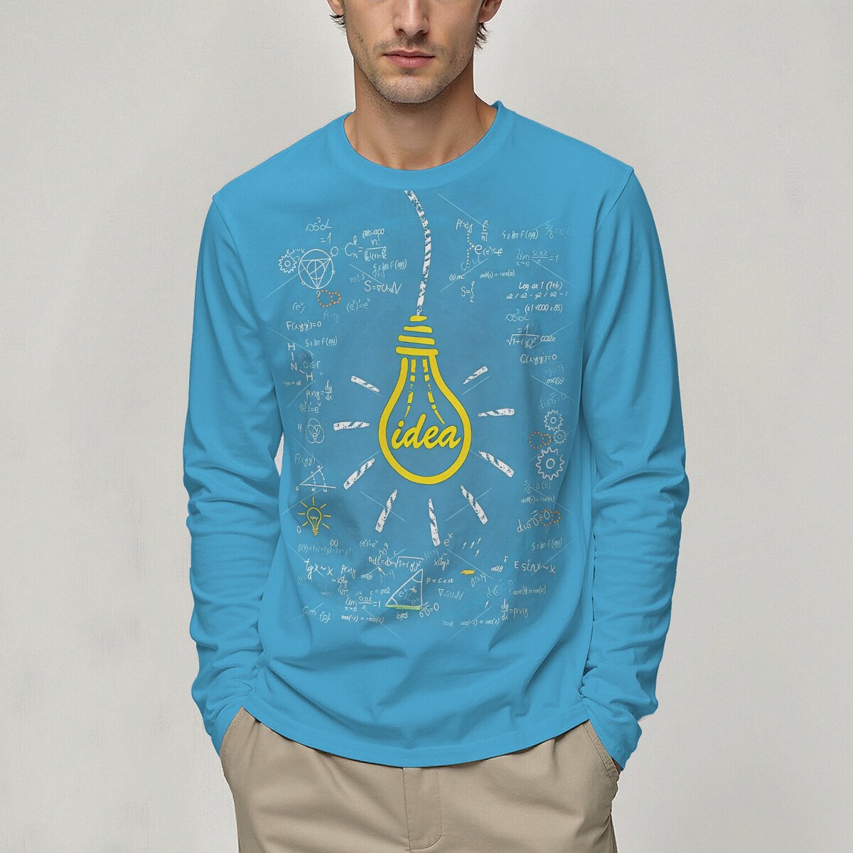 pull-science-idee-lumineuse-1 Sweat à capuche bleu avec illustration d'une ampoule et dessins scientifiques, parfait pour les amateurs de science et d'idées innovantes.