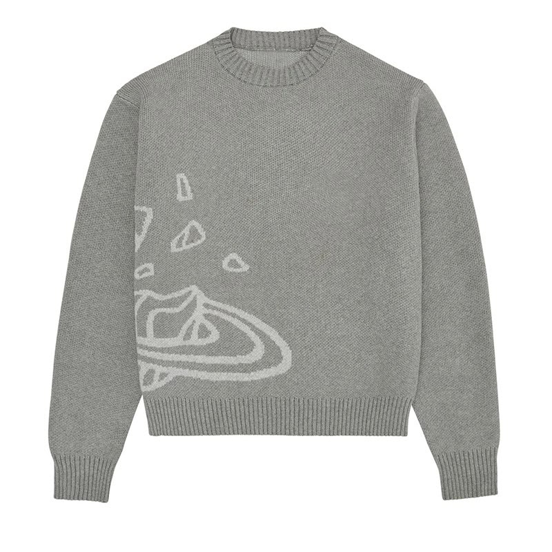 pull-tricot-planete-cosmique-1 Pull en laine gris clair avec motif scientifique discret, idéal pour une décoration de style scientifique ou pour un look décontracté inspiré de la science.