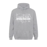 Vêtement hoodie gris avec slogan "Trust me, I'm an engineer" et motifs techniques.